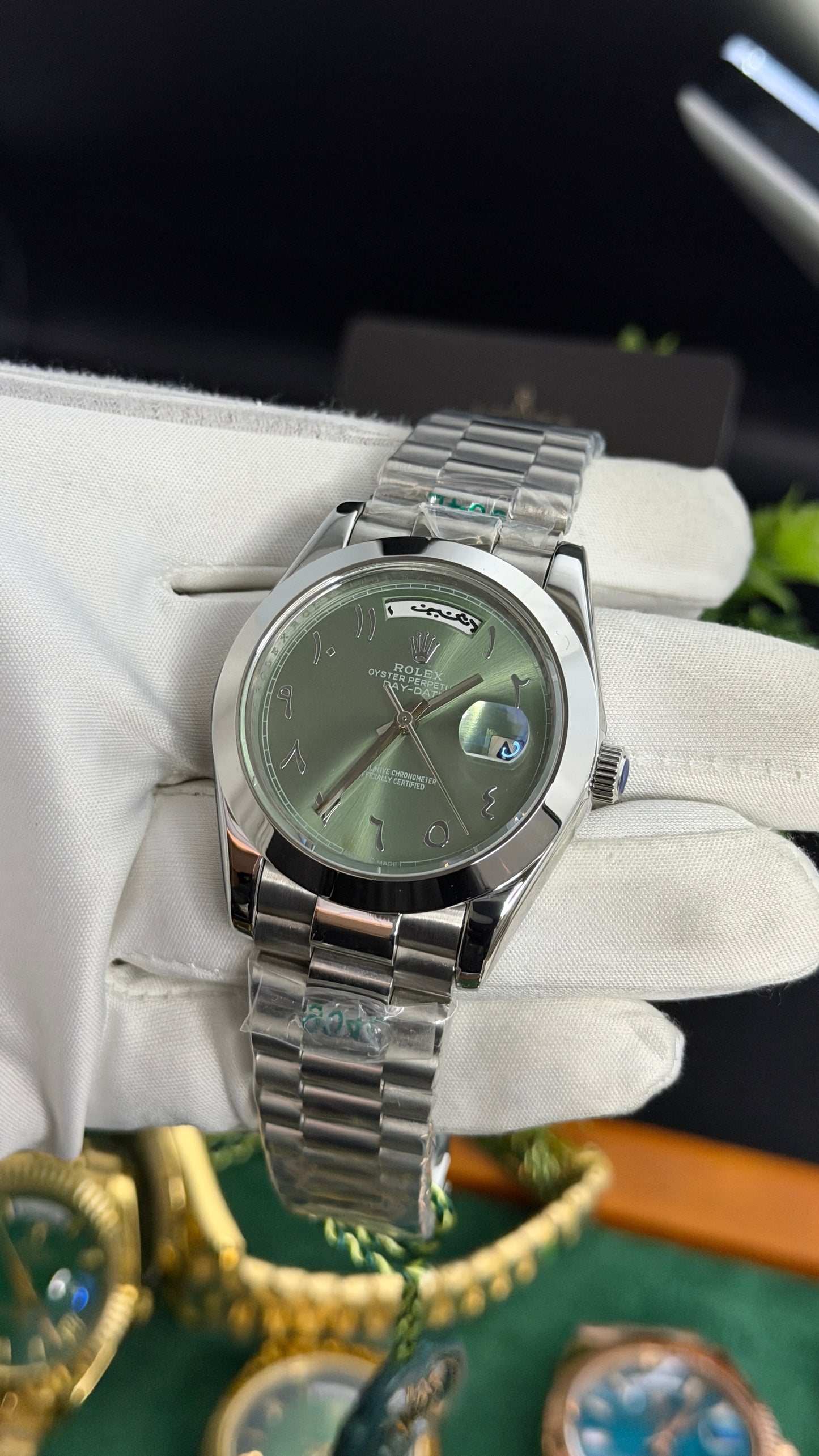 Silver with Green Dial