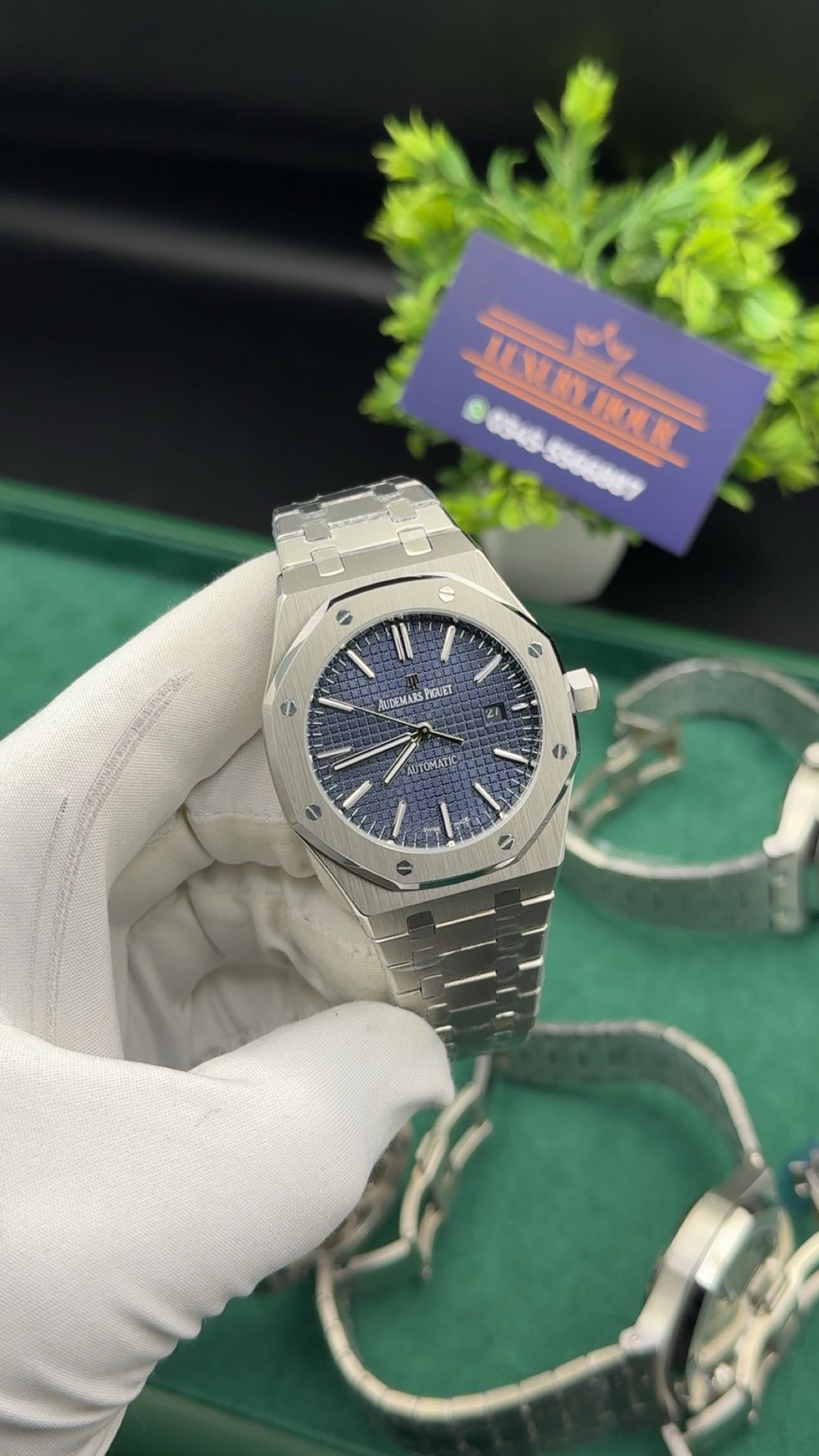 Silver with blue dial