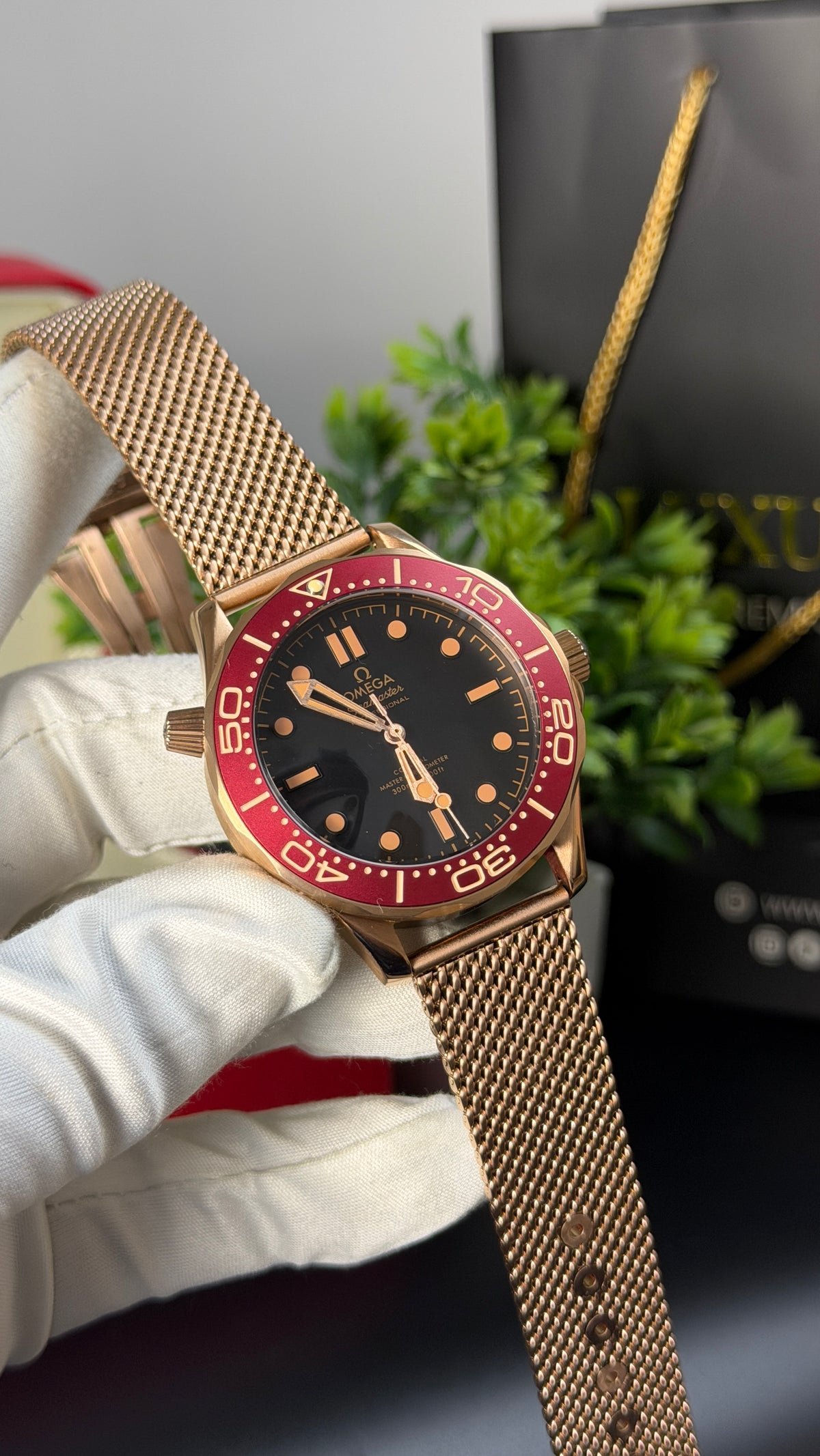Rose Gold with Black Dial.