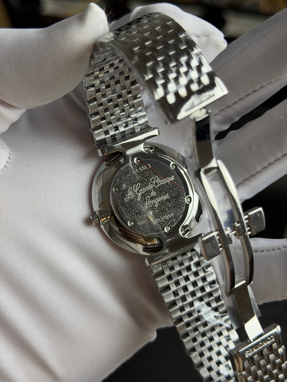 Silver with Maroon Dial.