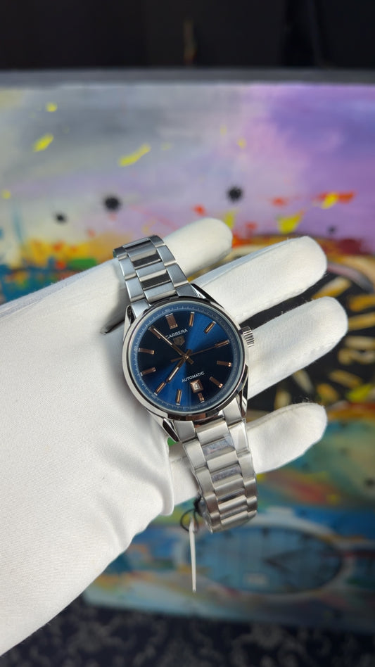 Silver with blue dial