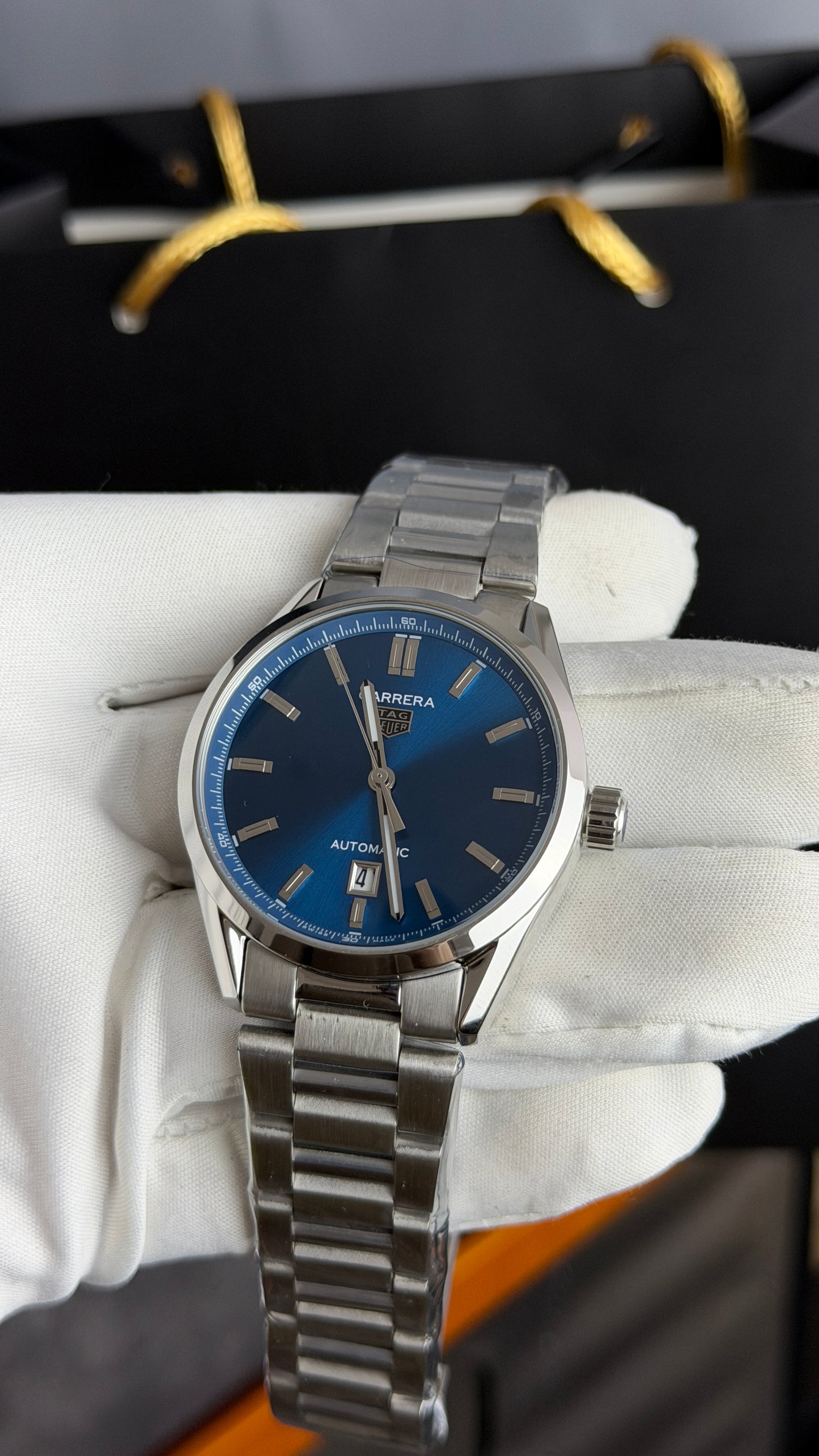 Silver with Blue Dial.