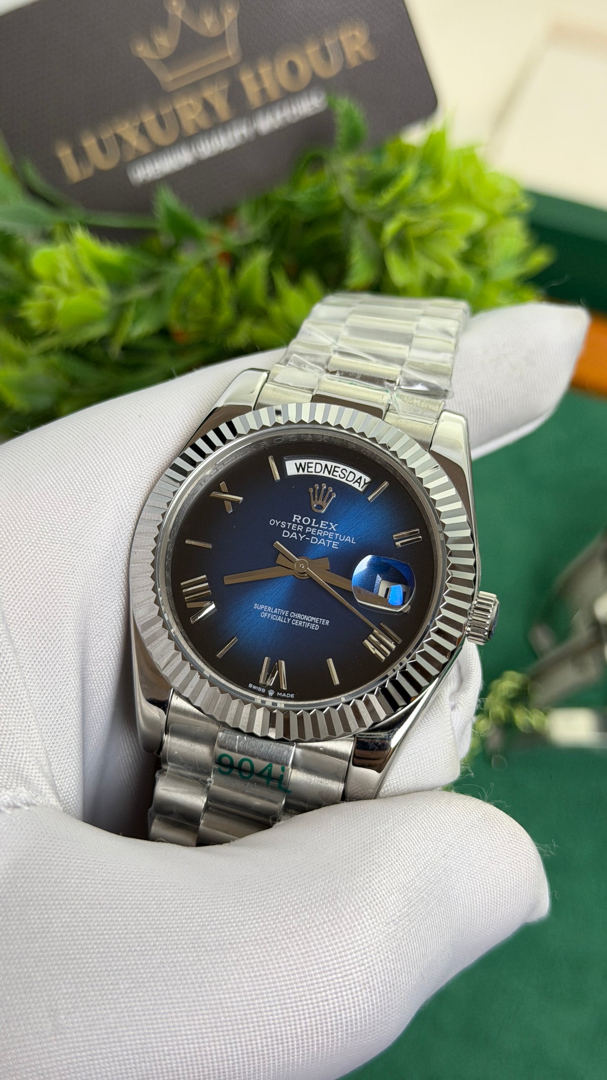 Silver with Blue Dial.