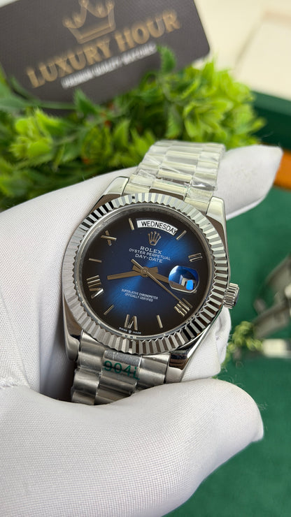 Silver with Blue Dial.