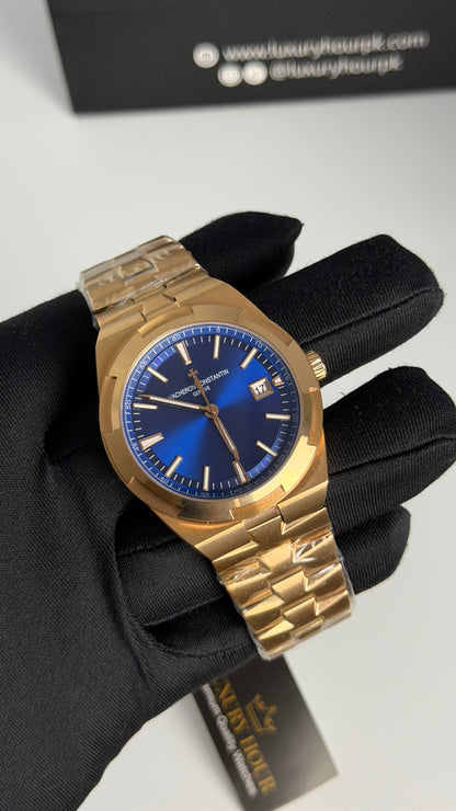 Rose Gold with Aqua Dial.