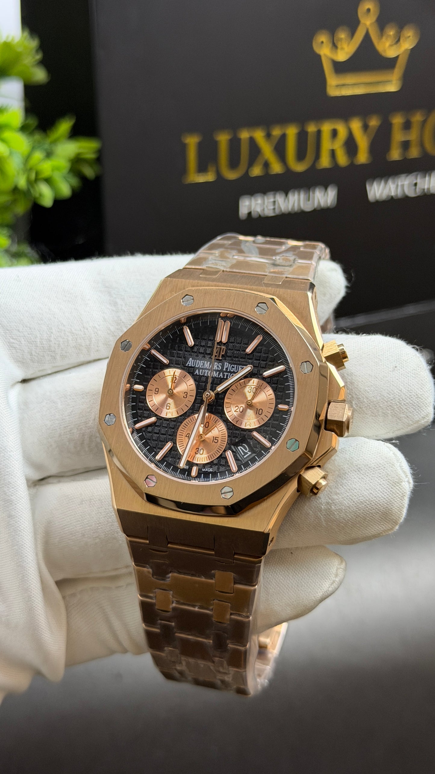 Rose Gold with Black Dial.