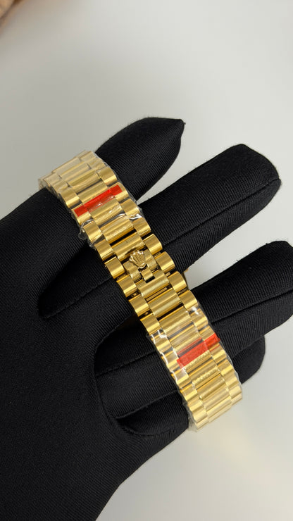 Yellow Gold with Black Dial.