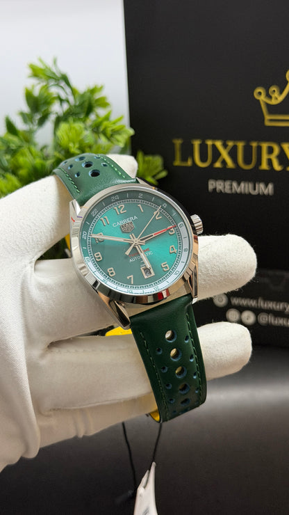 Silver with Green Dial.