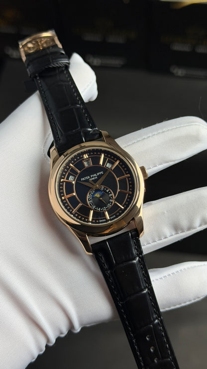 Rose Gold with Black Dial.