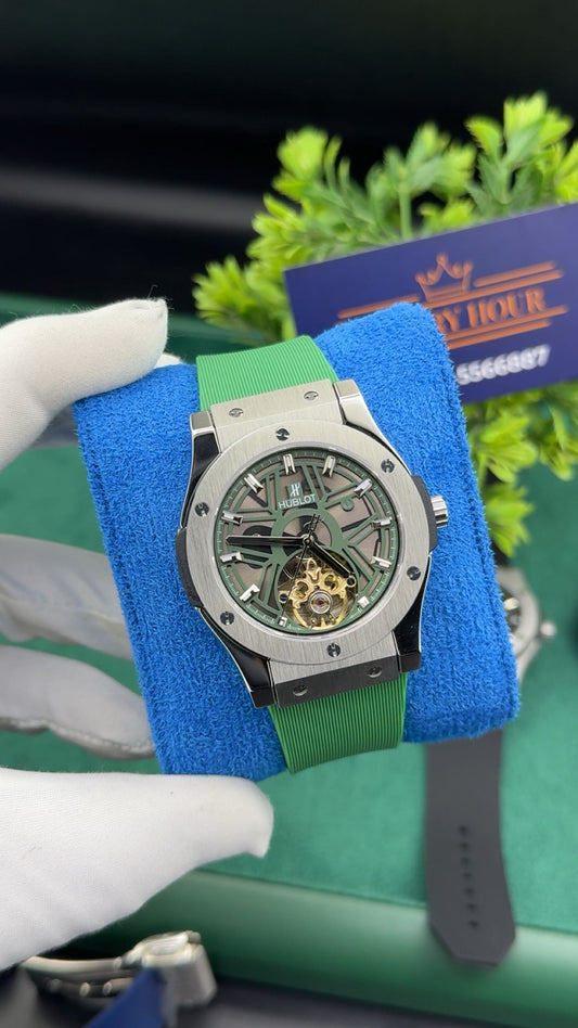 Silver with green dial