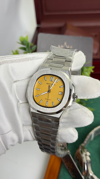 Silver with Yellow Dial.