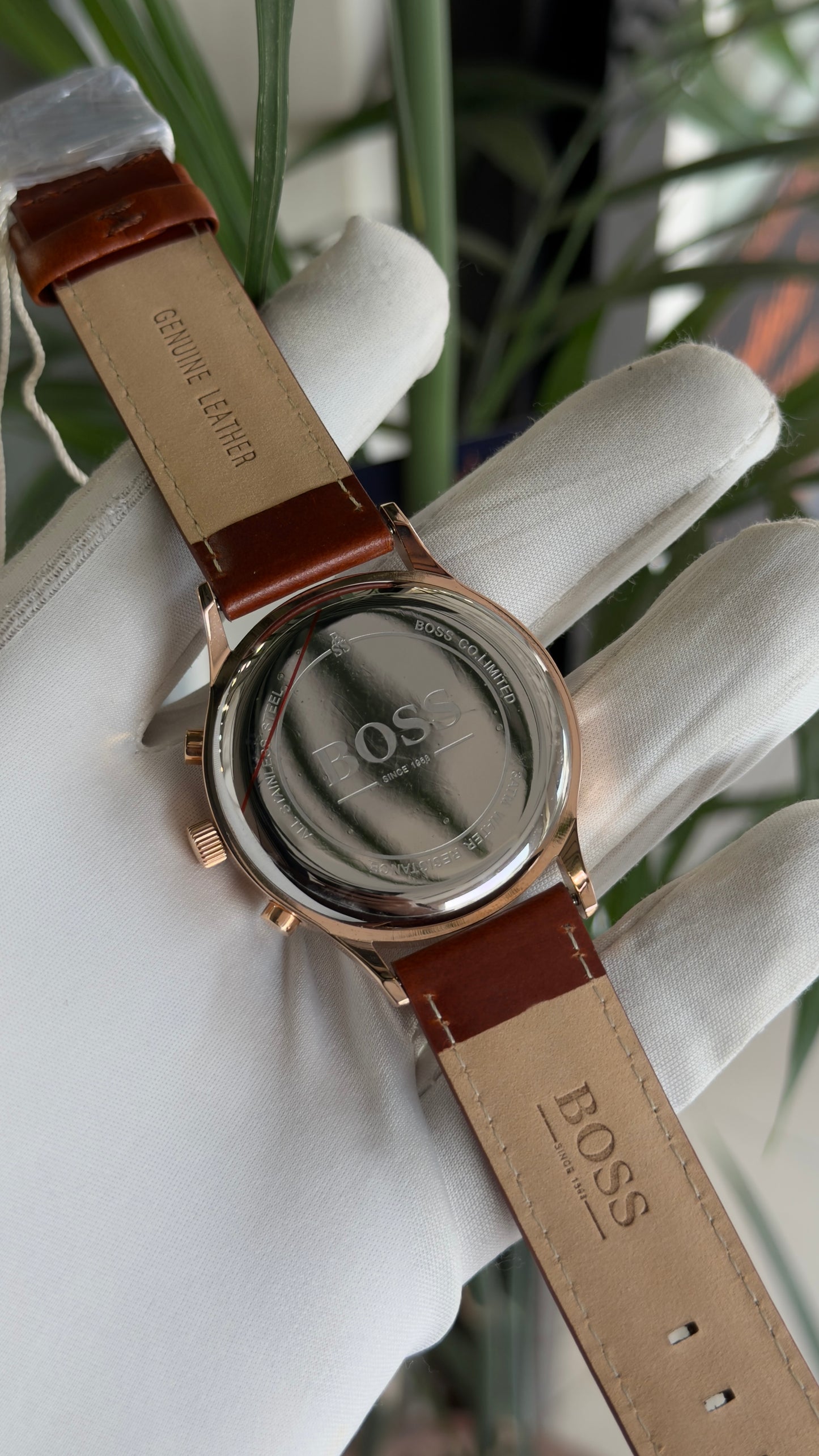 Rose gold with black dial brown strap
