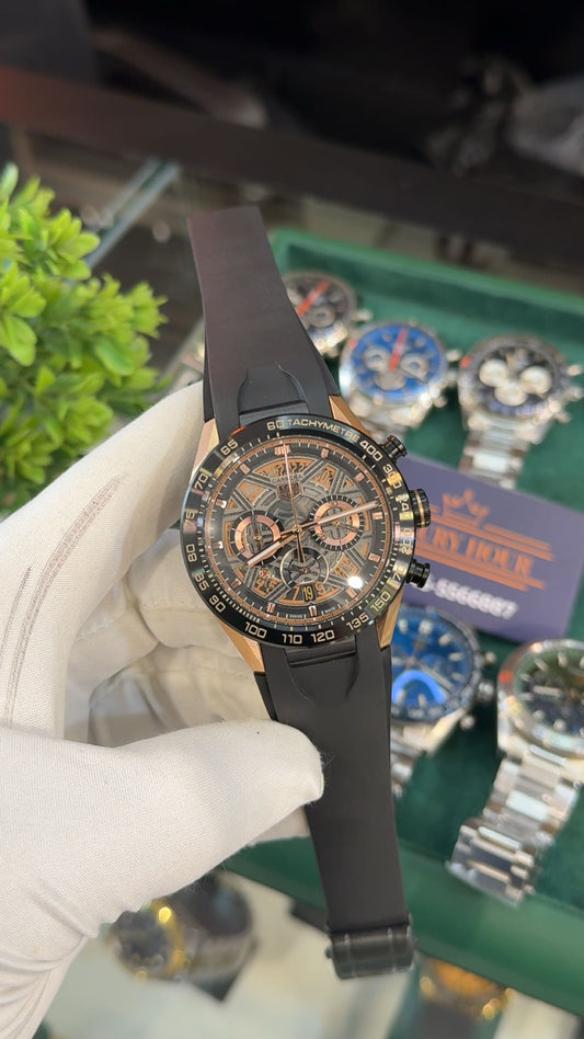 Rose gold with black dial