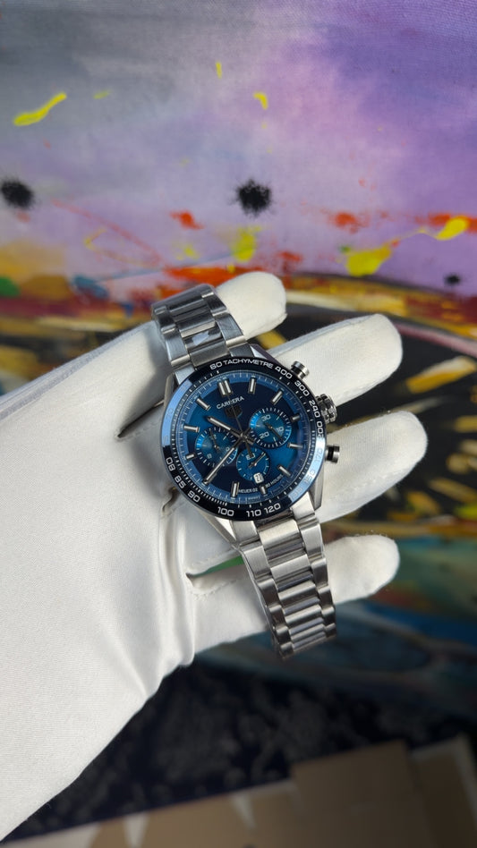 Silver with blue dial