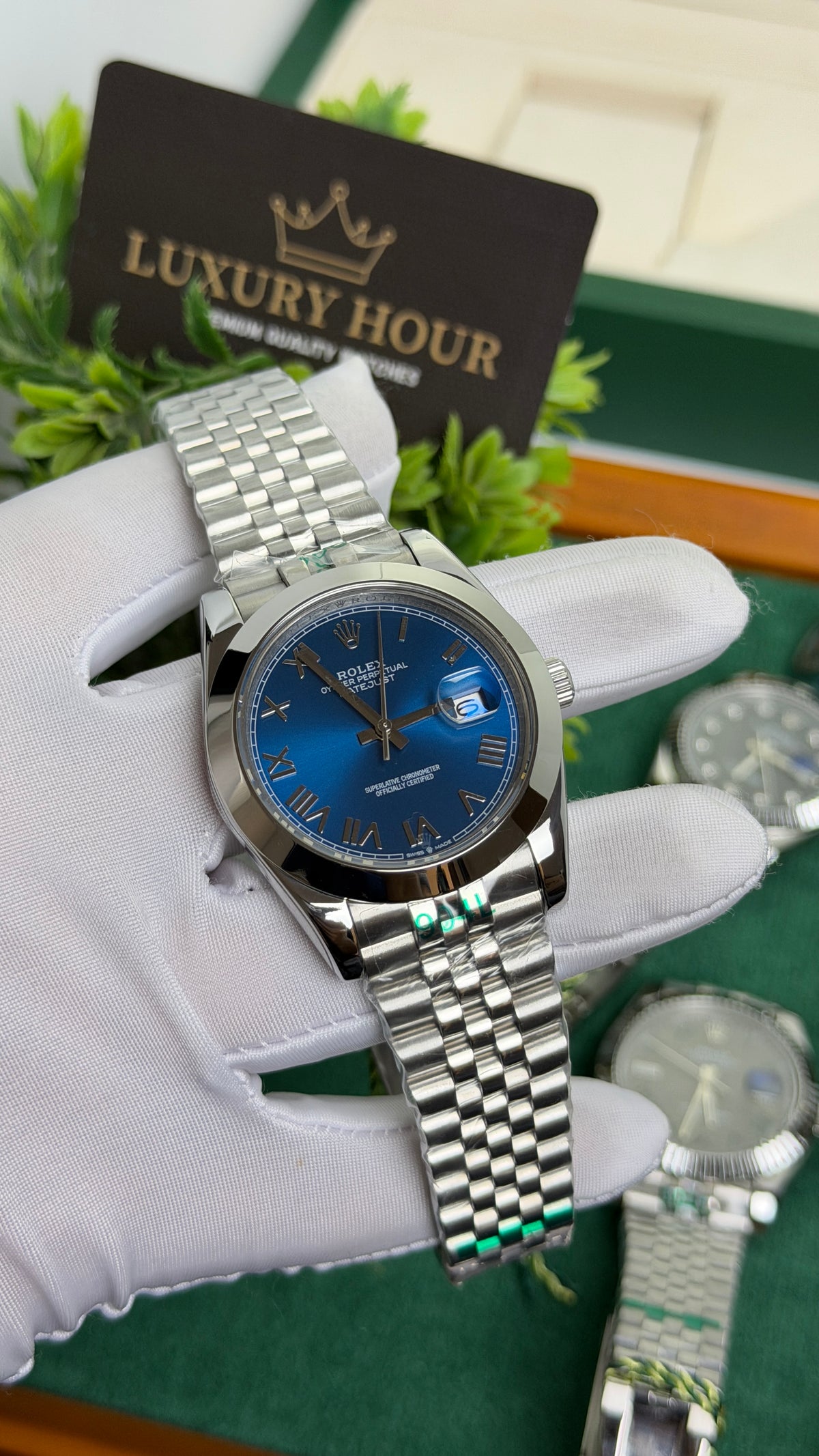 Silver with Blue Dial.