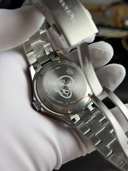 Silver with Blue Dial.