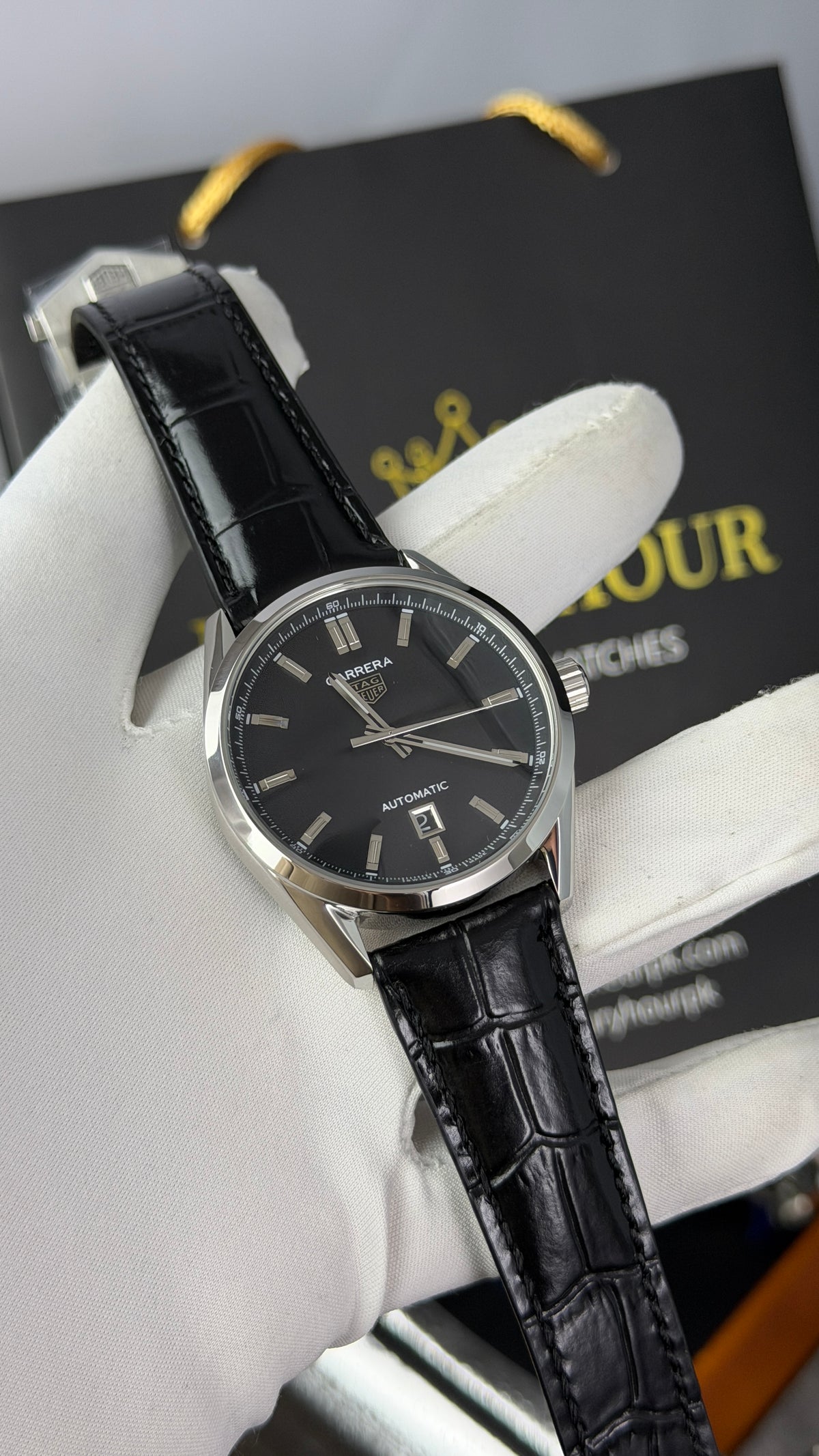 Silver with Black Dial.