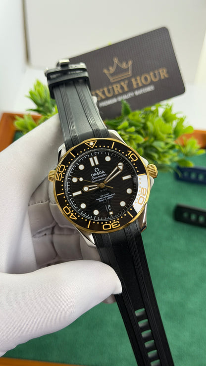 Yellow Gold with Black Dial.