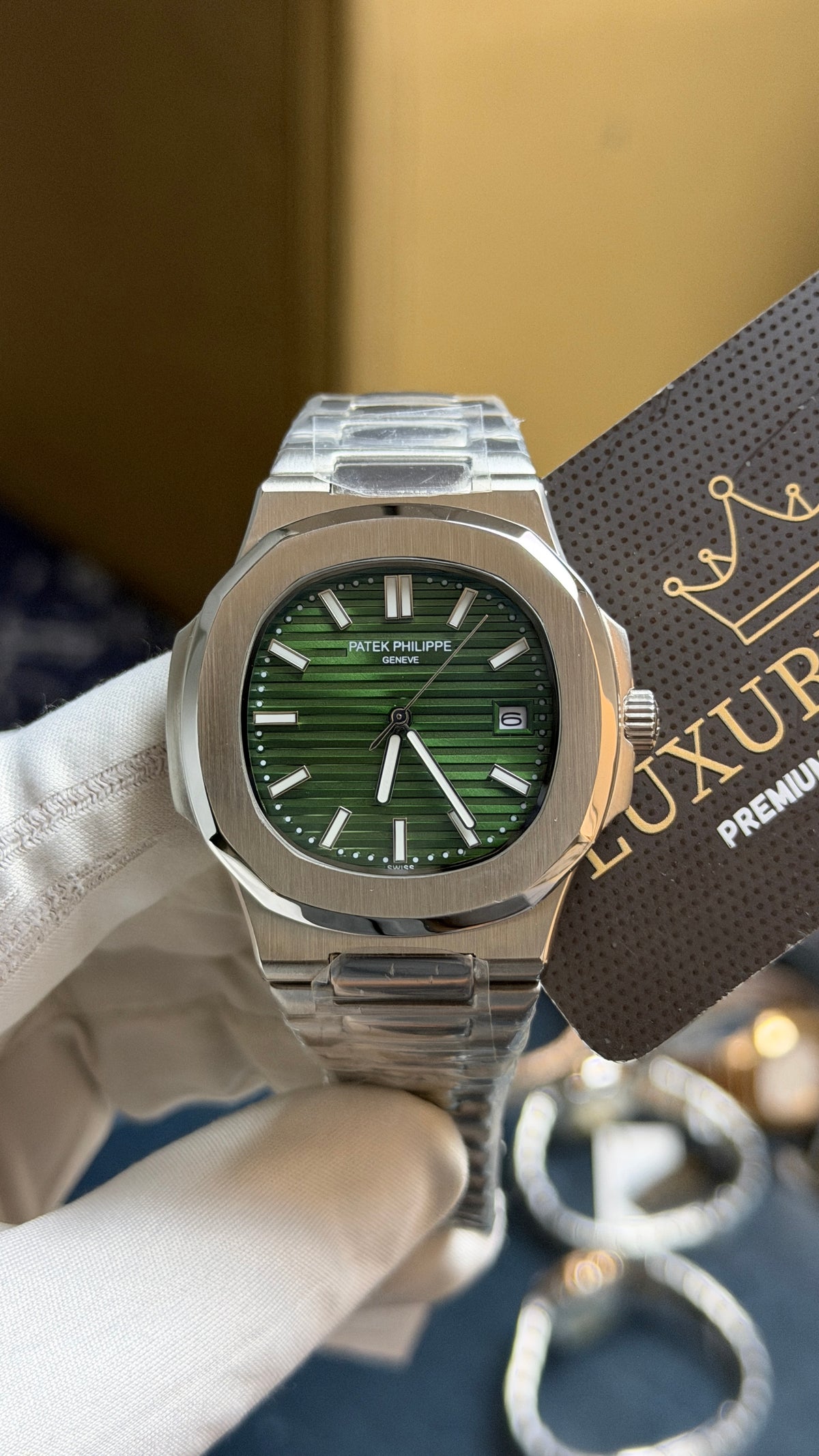 Silver with Green Dial.