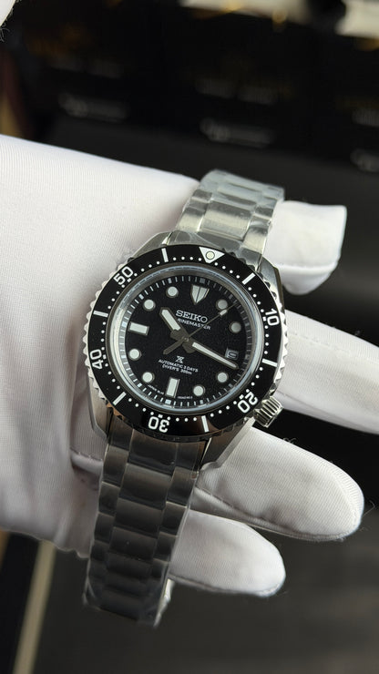 Silver with Black Dial.