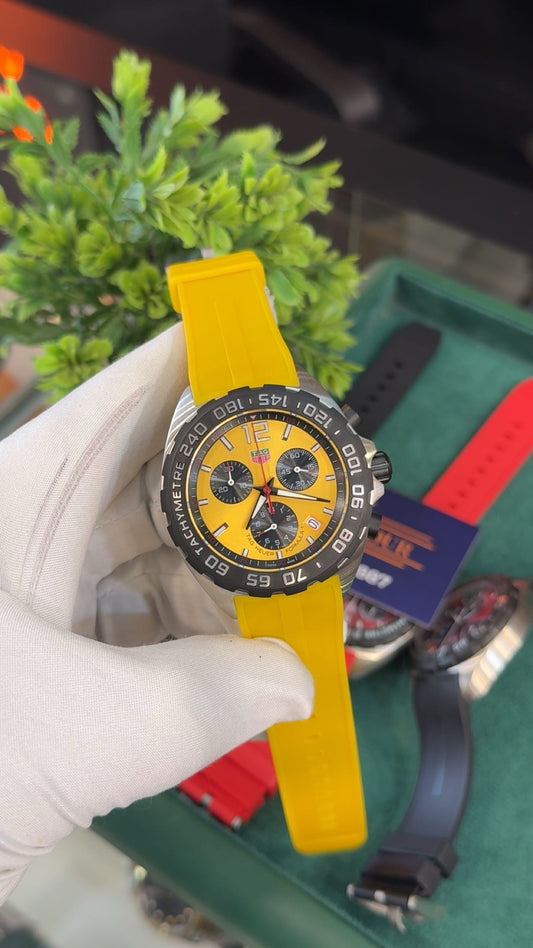 Silver with yellow dial