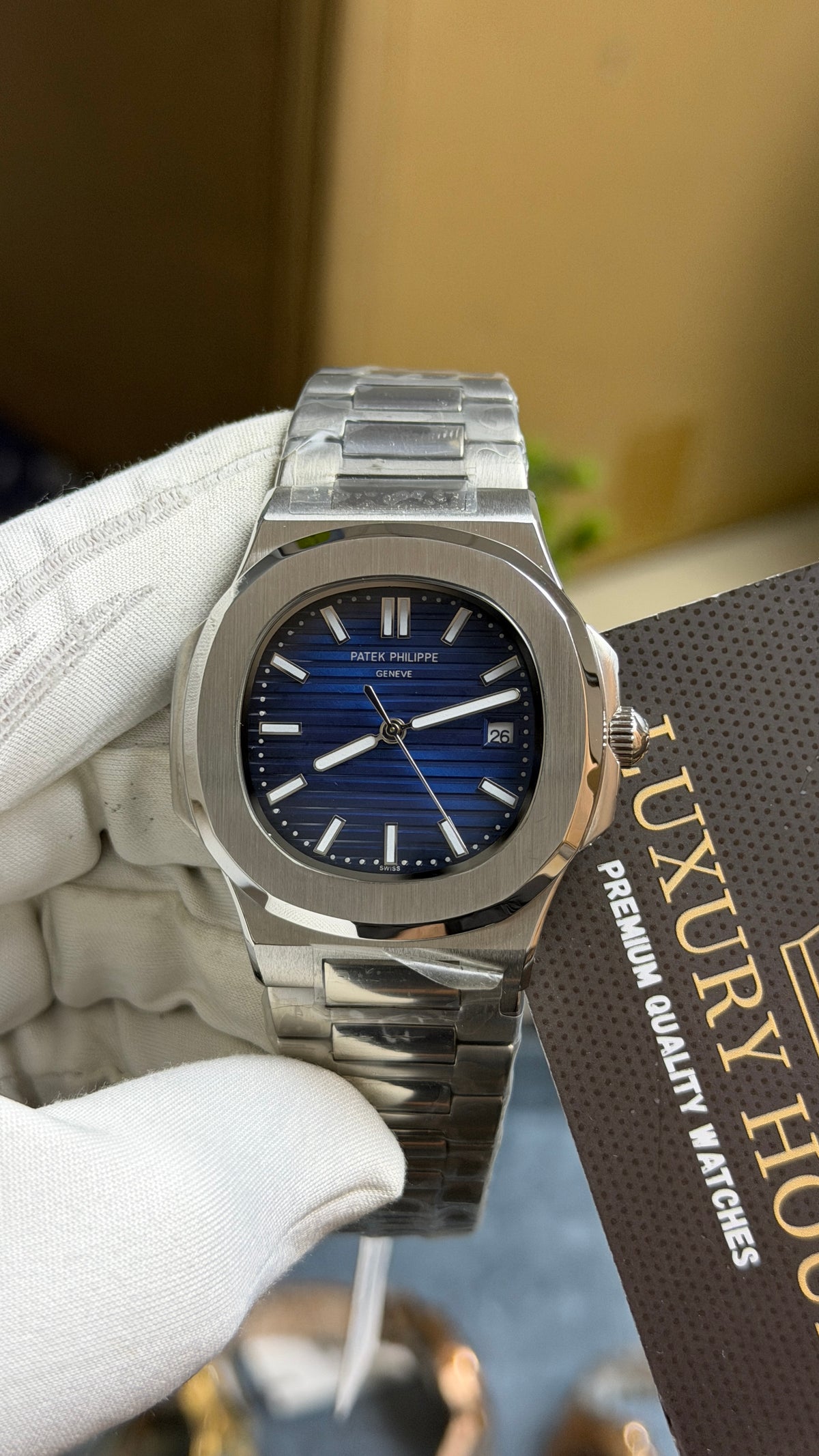 Silver with Blue Dial.
