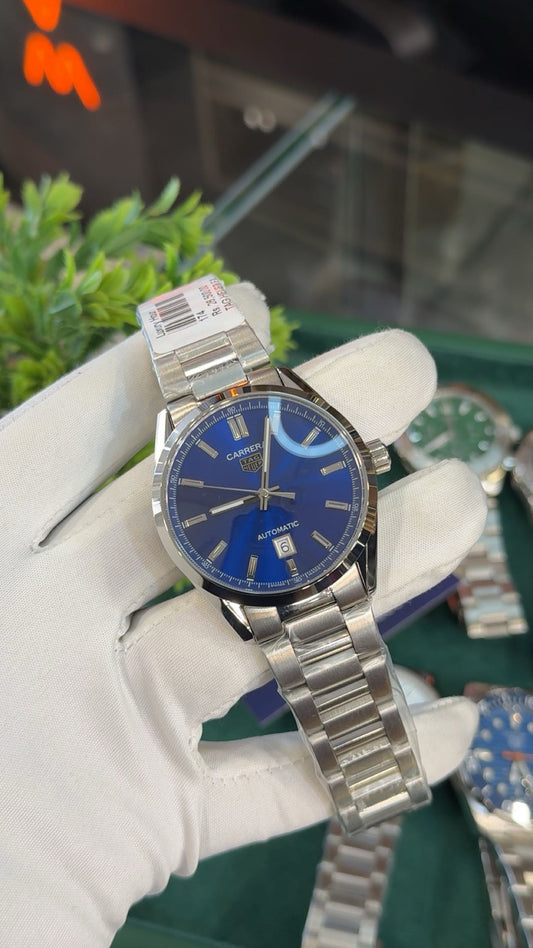 Silver with blue dial