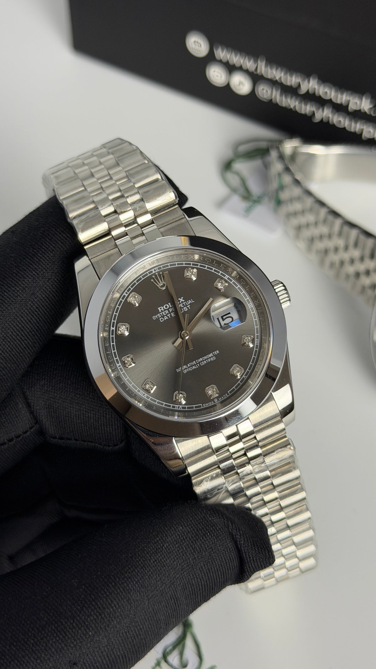 Silver with grey dial