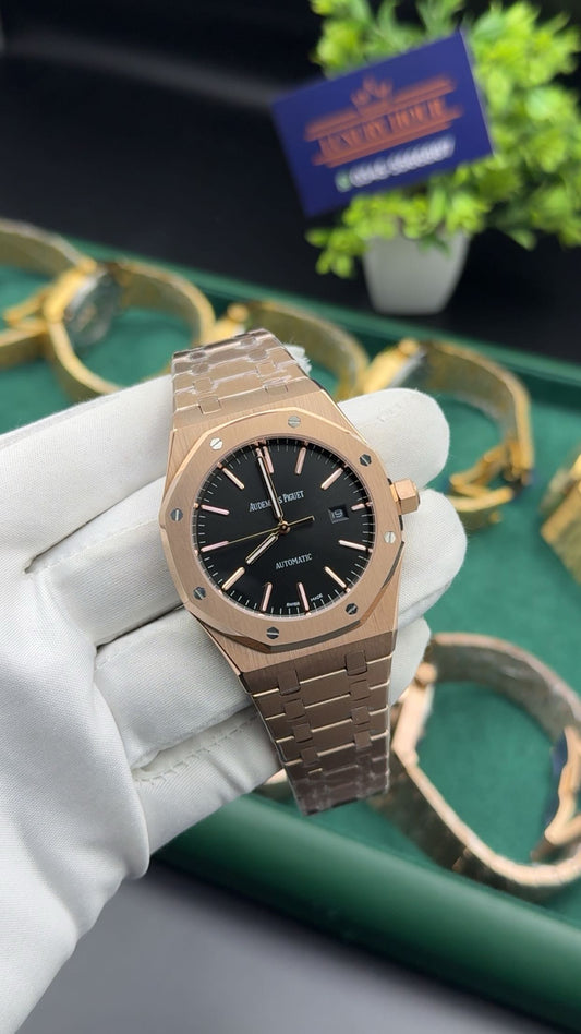 Rose gold with black dial