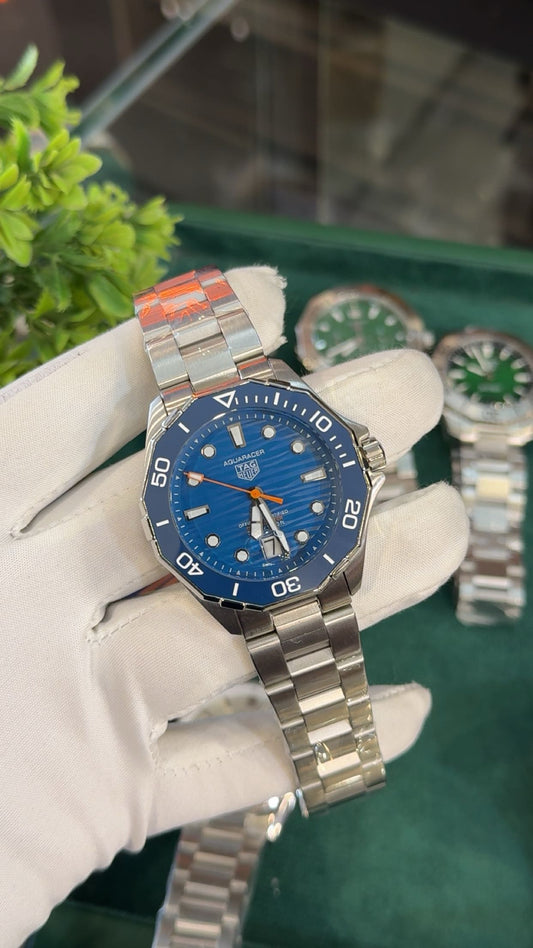 Silver with blue dial