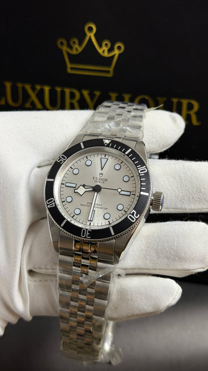 Silver with White Dial.