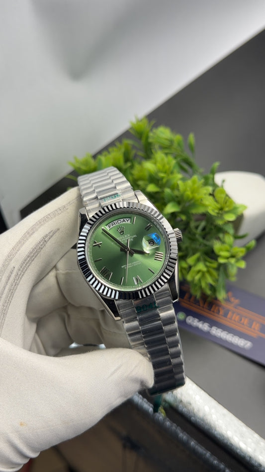 Silver with green dial🔥