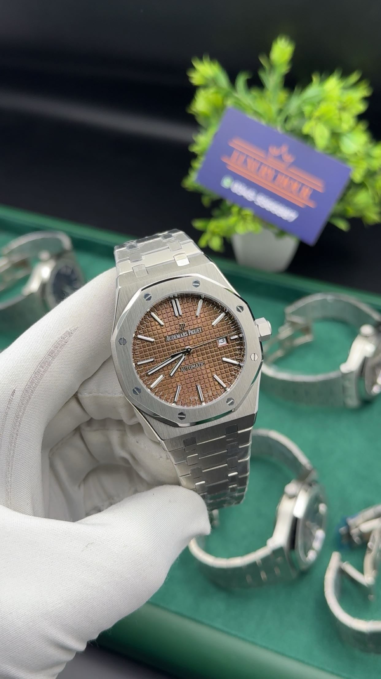 Silver with brown dial