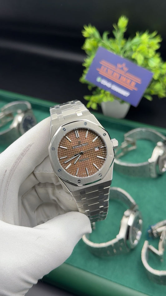 Silver with brown dial