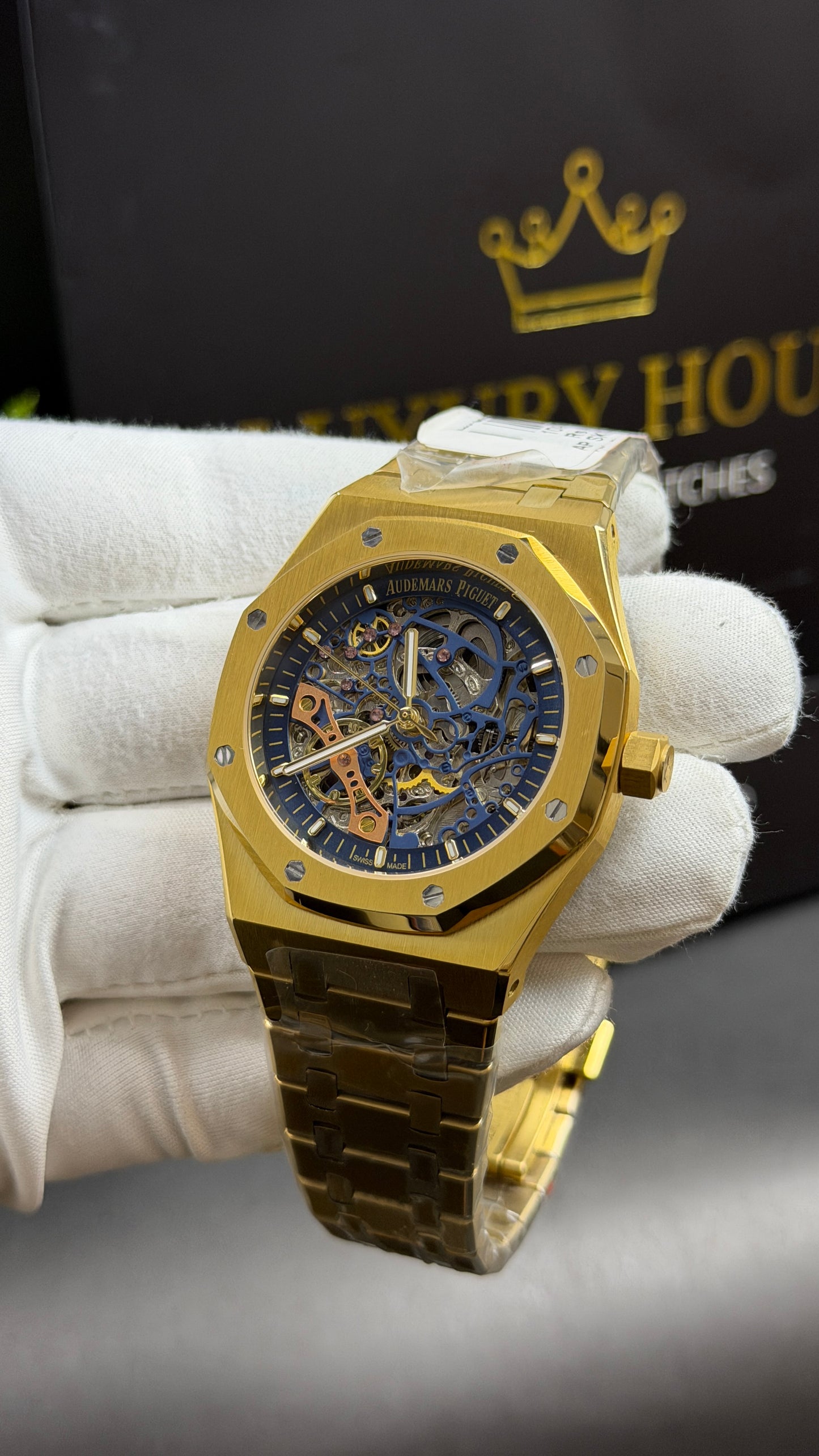 Yellow Gold with Blue Skeleton Dial.