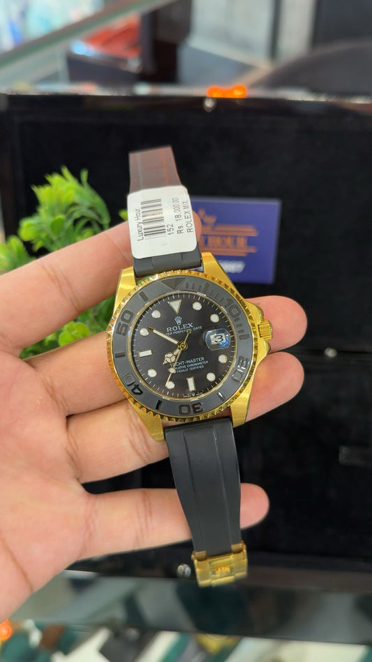 Gold with black dial
