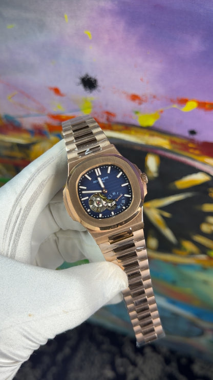 Rose gold with blue dial
