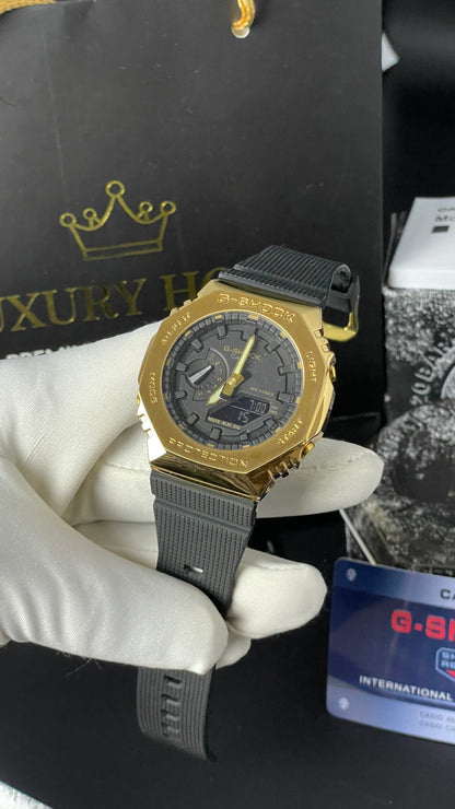 Yellow Gold with Black Dial.