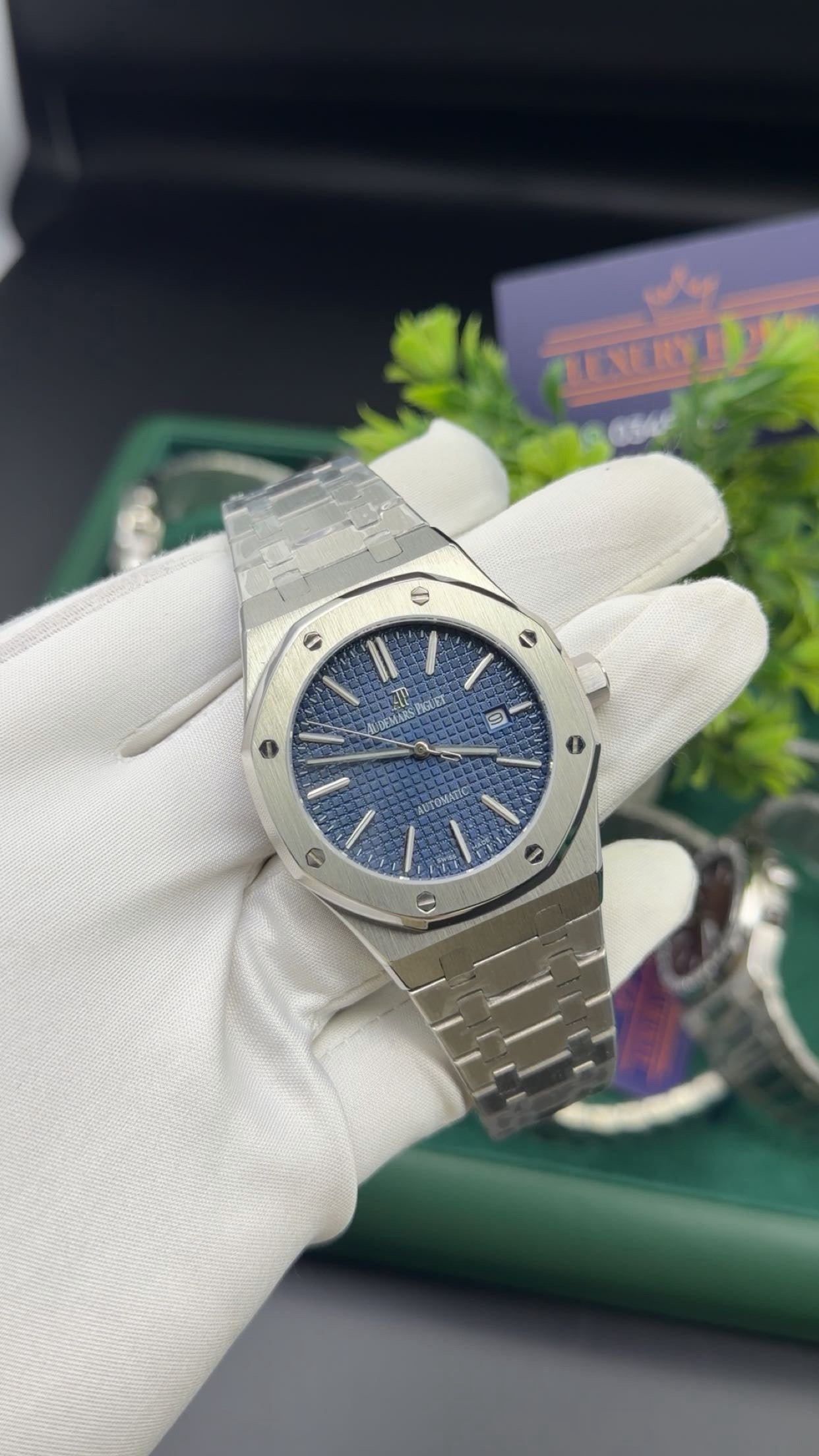 Silver with blue dial