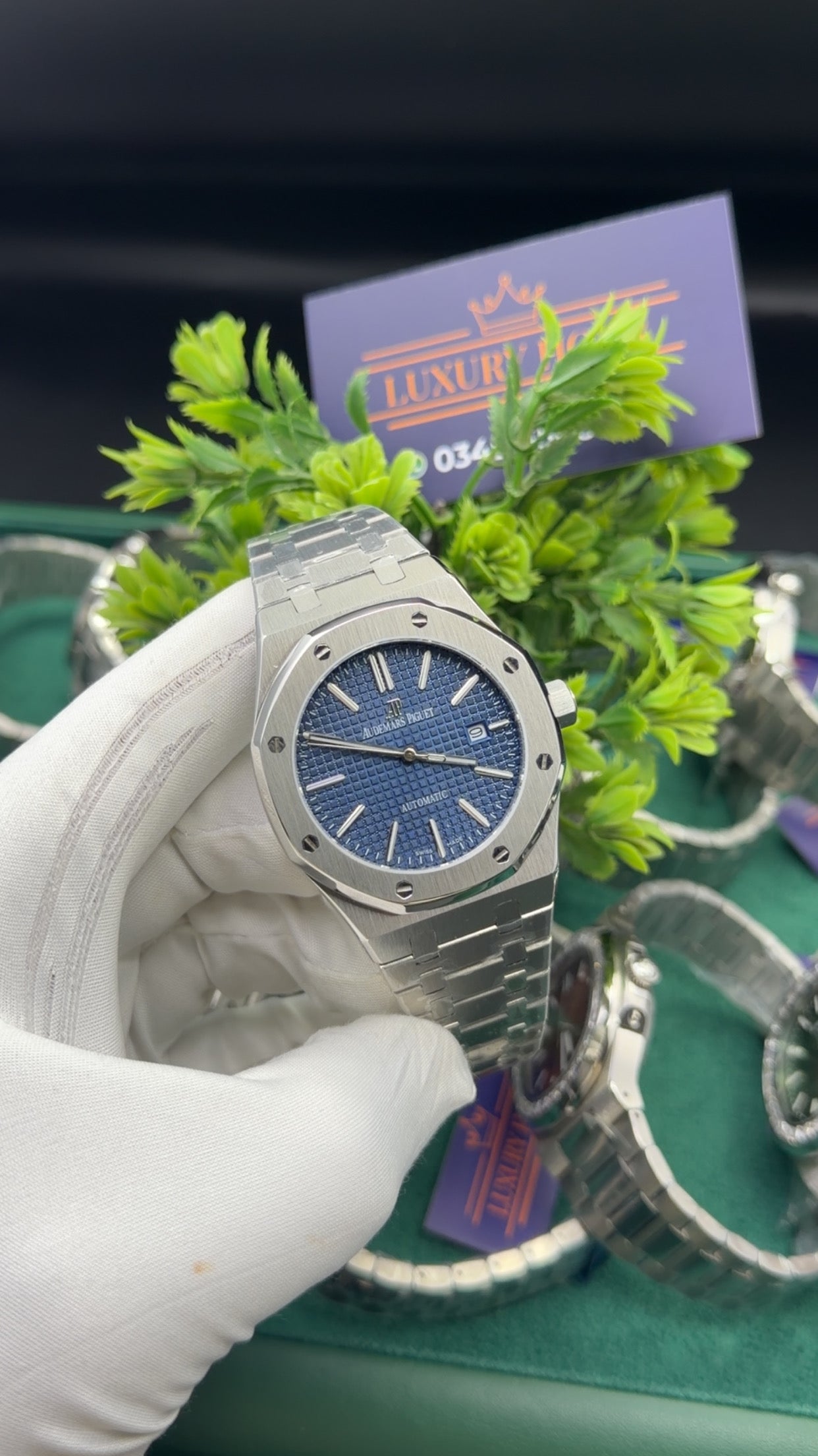 Silver with blue dial