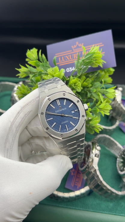 Silver with blue dial