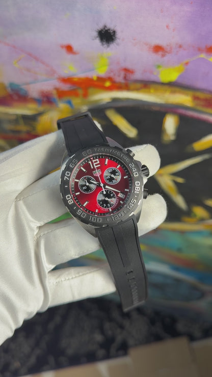 Silver with red dial