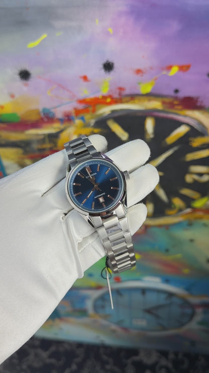 Silver with blue dial