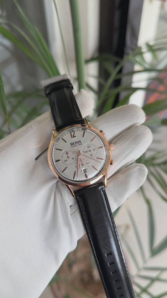 Rose gold with white dial black strap