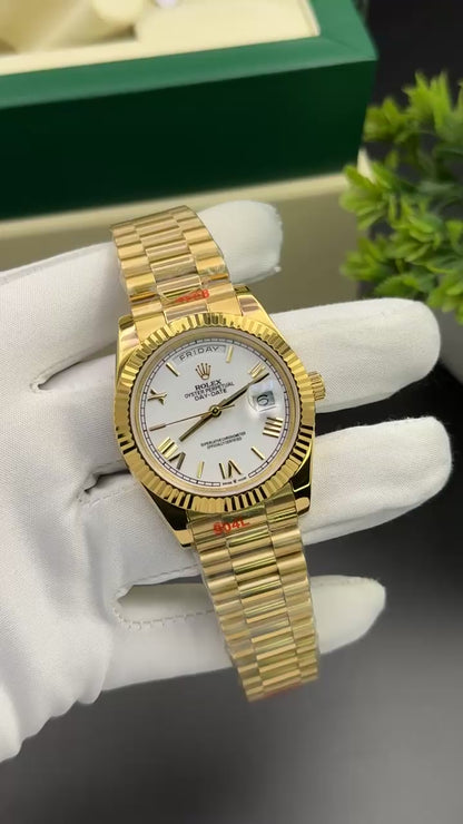 Yellow gold with white dial