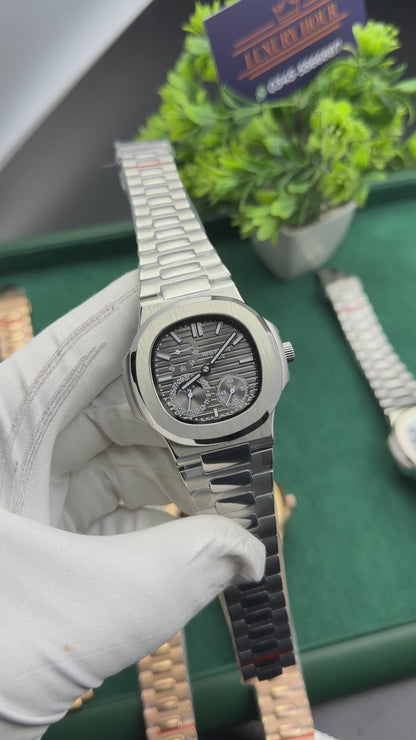 Silver with black dial