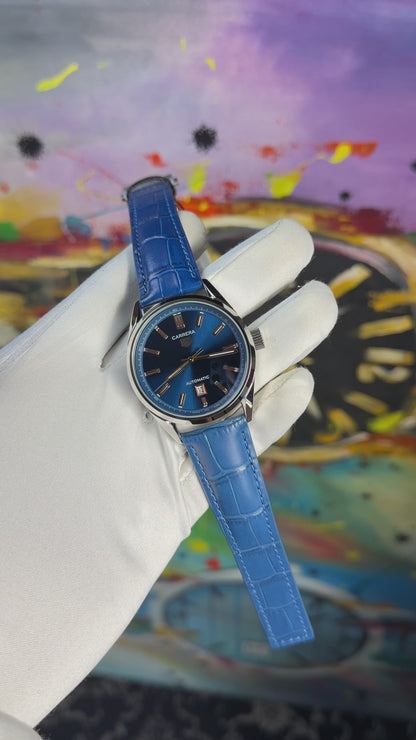 Silver with dark blue dial