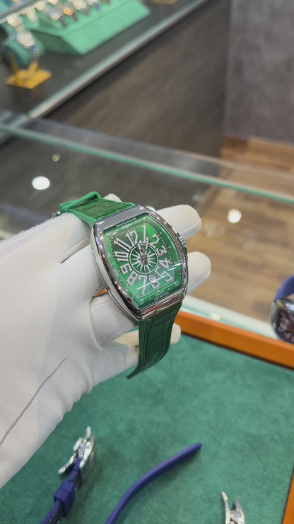 Silver with Green Dial.