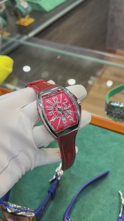 Silver with Red Dial.