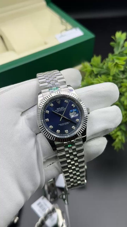 Silver with blue dial